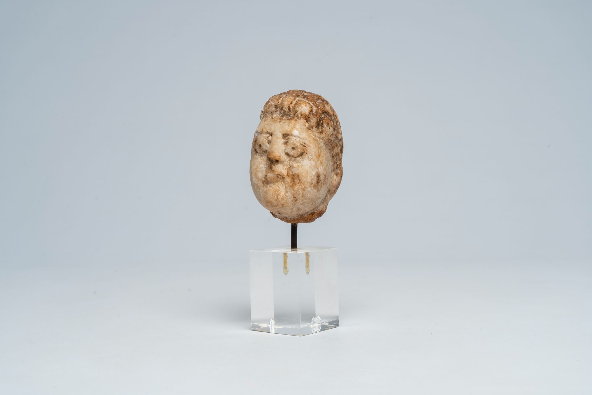 A Romanesque marble head of a man, most probably 14th/15th C. - Image 2 of 8