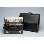 An Italian 'Fratelli Crosio' chromatic accordion with piano keyboard and box, ca. 1950/60