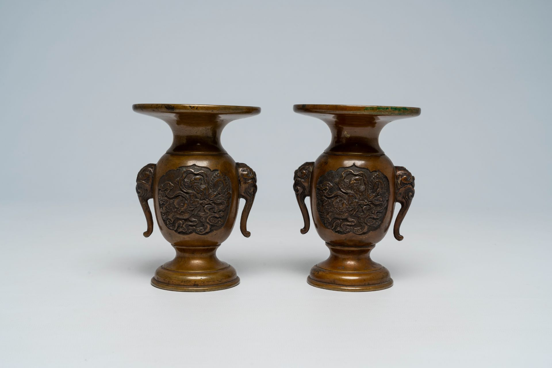 A pair of Japanese bronze vases, two mixed metal chargers with relief design, a blue and white dish - Image 18 of 21
