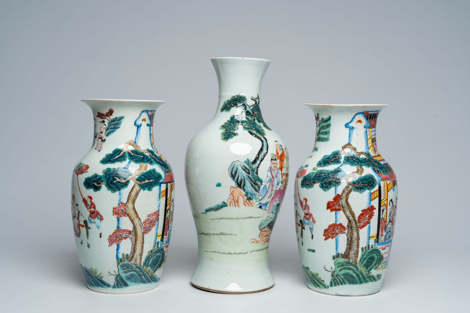 A Chinese famille rose baluster shaped 'Immortals' vase and a pair of vases with palace scenes, 19th - Image 4 of 6