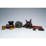 A varied collection of Chinese and Japanese cast and carved works of art, 19th/20th C.