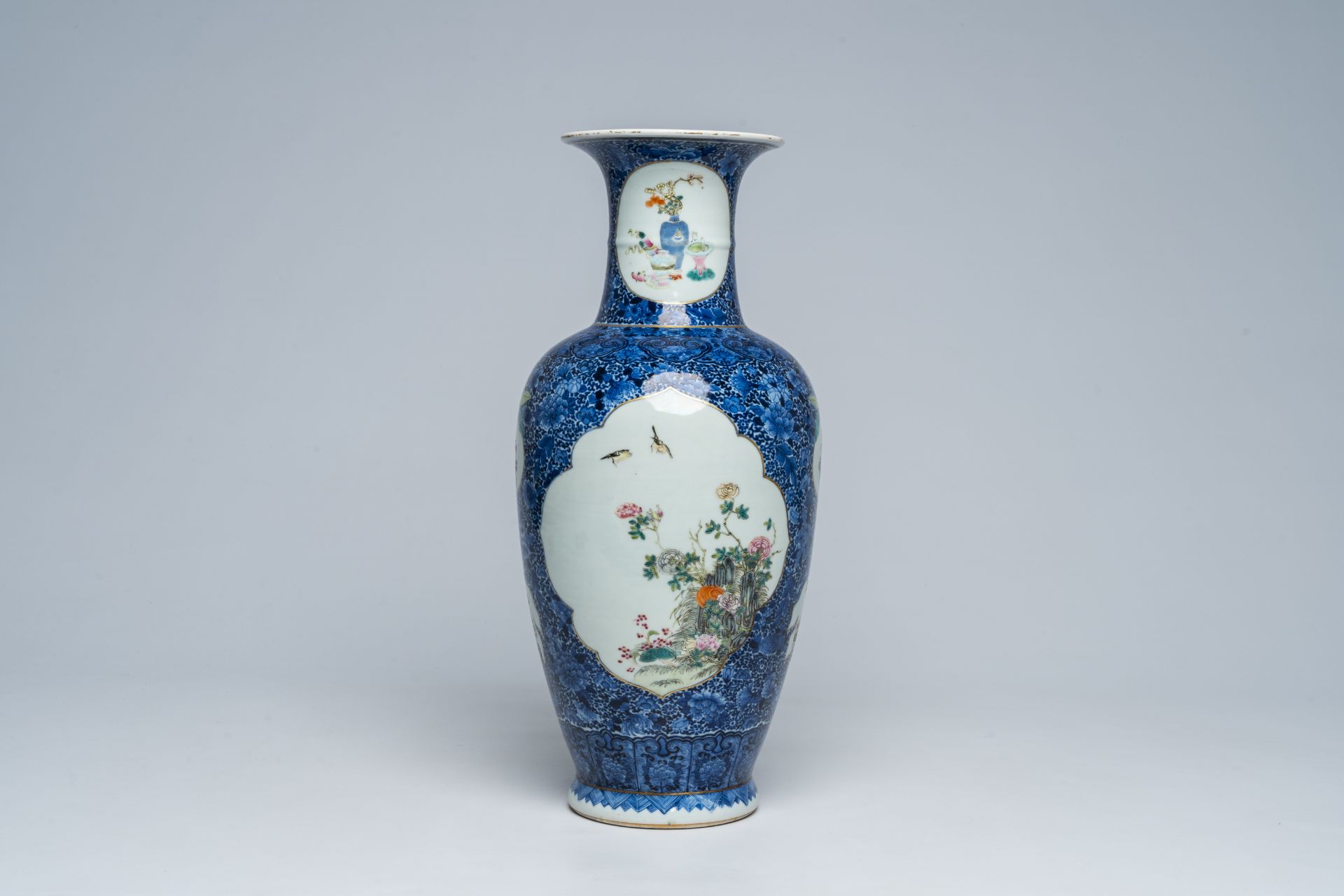 A Chinese famille rose vase with birds among blossoming branches, Qianlong mark, Republic, 20th C.