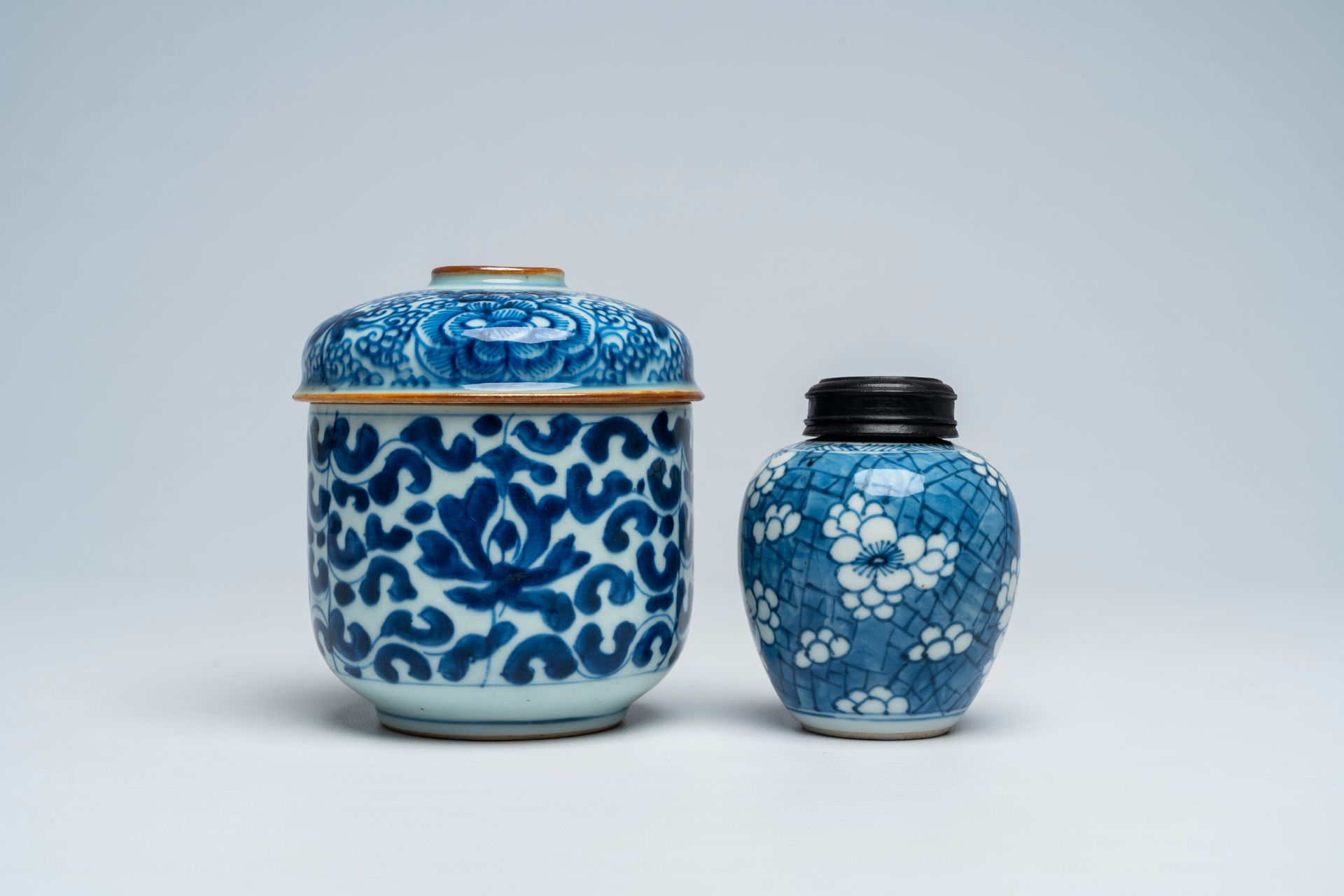 A Chinese blue and white covered bowl and a small vase, Kangxi