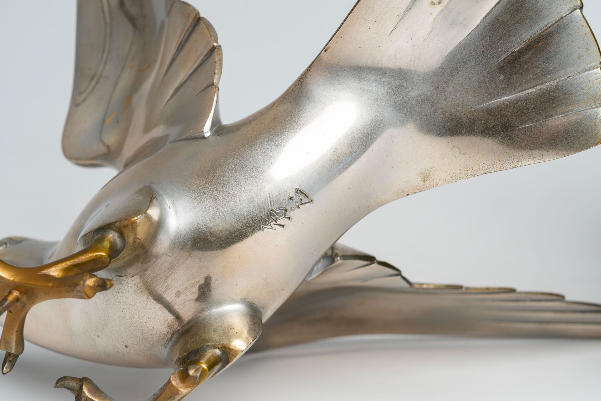 A Japanese patinated and silver-plated metal okimono of an eagle on a rock, signed Hidemasa, 20th C. - Image 17 of 17