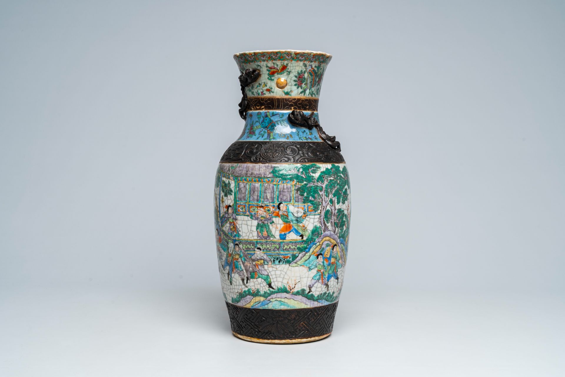 A Chinese Nanking crackle glazed bronze mounted famille rose 'warrior' vase, 19th C. - Image 2 of 7