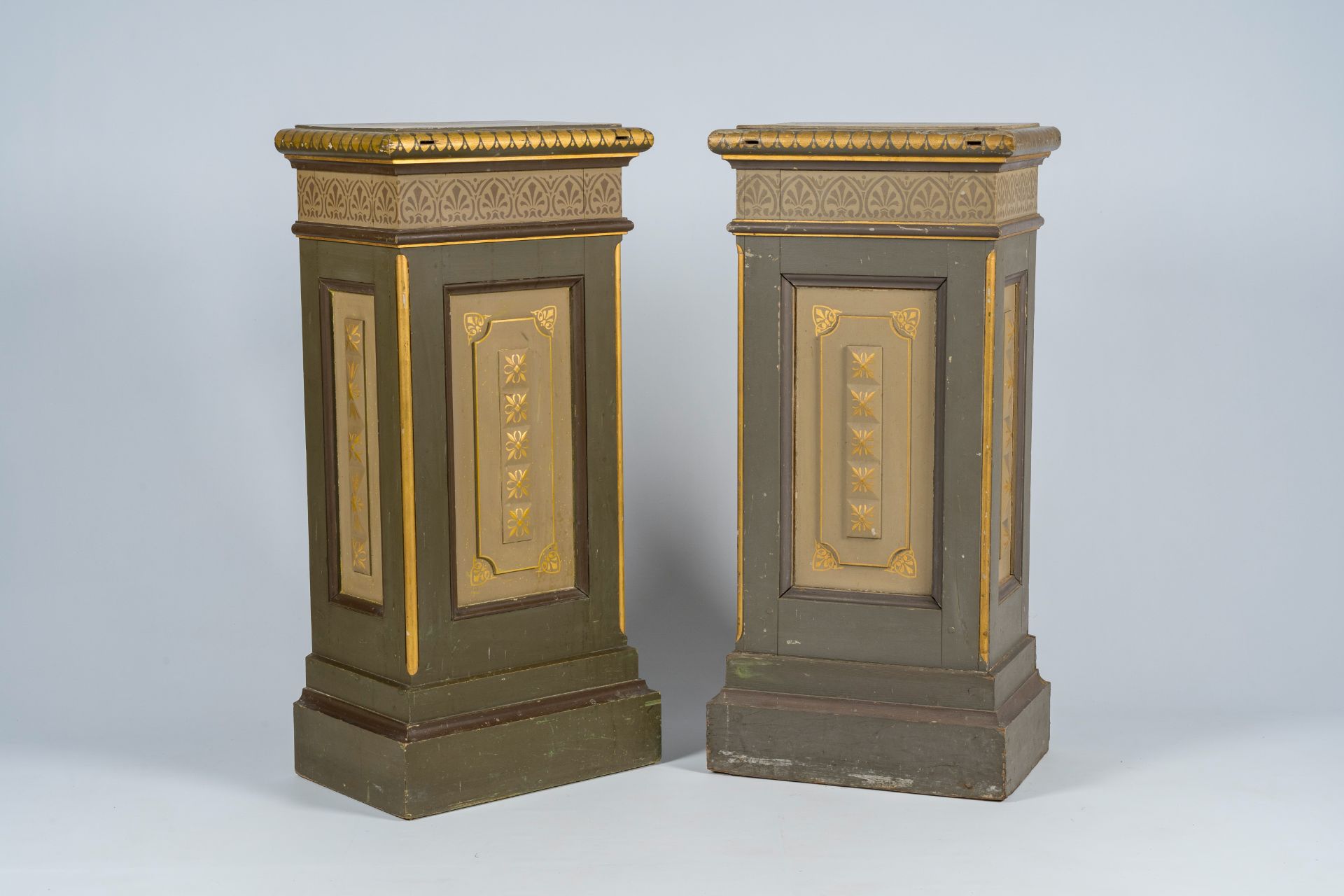 A pair of Flemish or French Gothic revival polychrome painted and gilt wood pedestals, first quarter