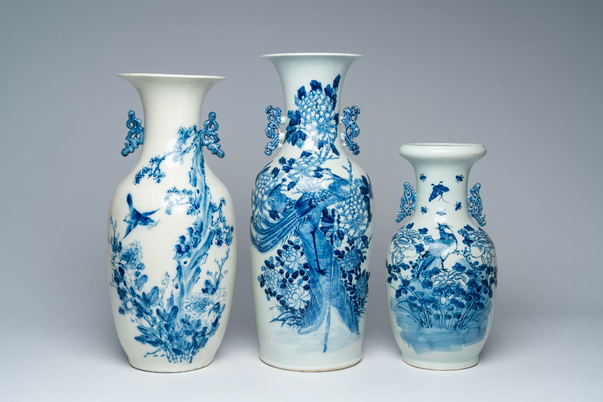 Three Chinese blue and white vases with birds among blossoming branches, 19th/20th C.