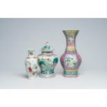 Three Chinese famille rose vases with floral design, 19th C.