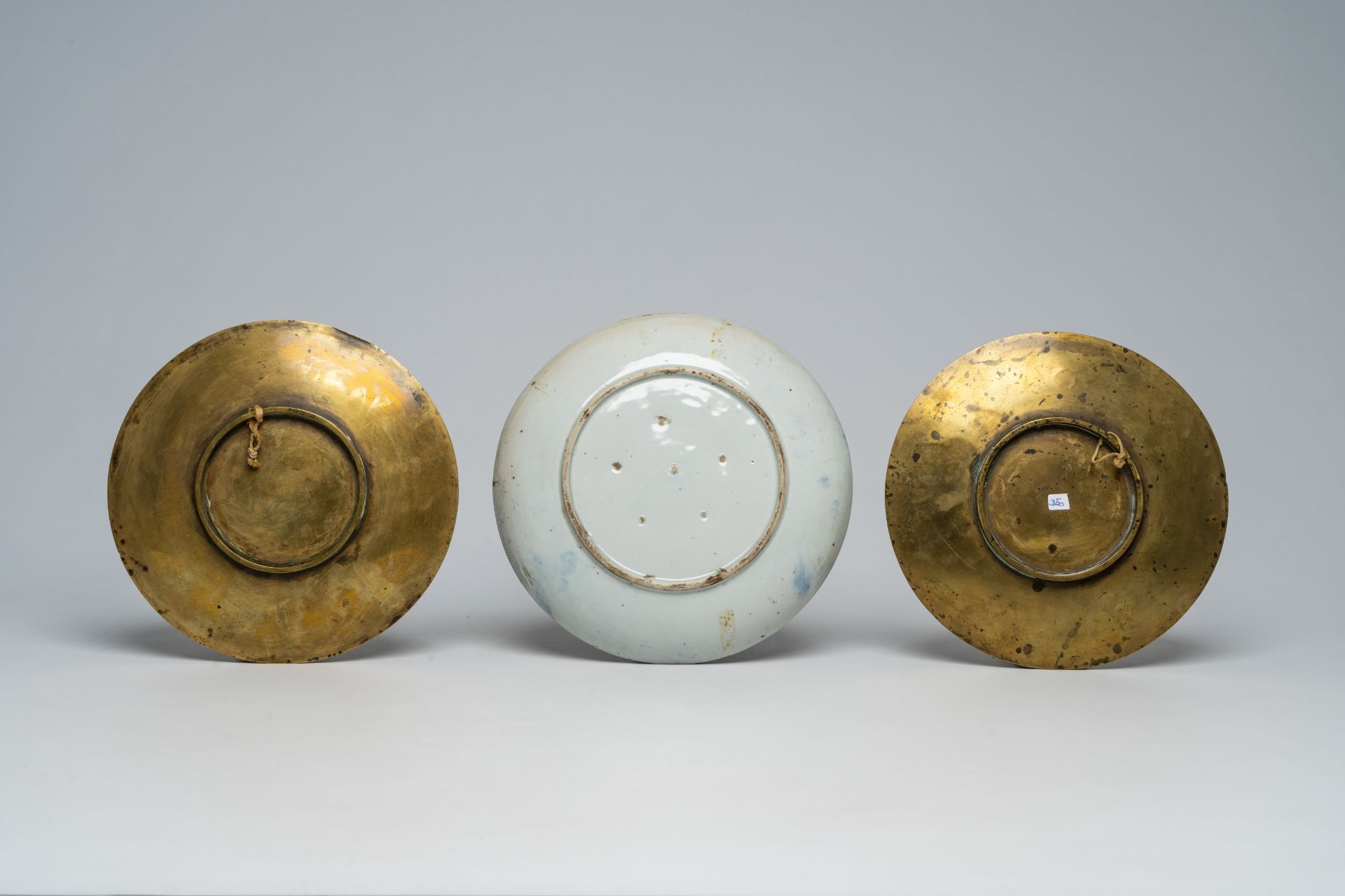 A pair of Japanese bronze vases, two mixed metal chargers with relief design, a blue and white dish - Image 2 of 21