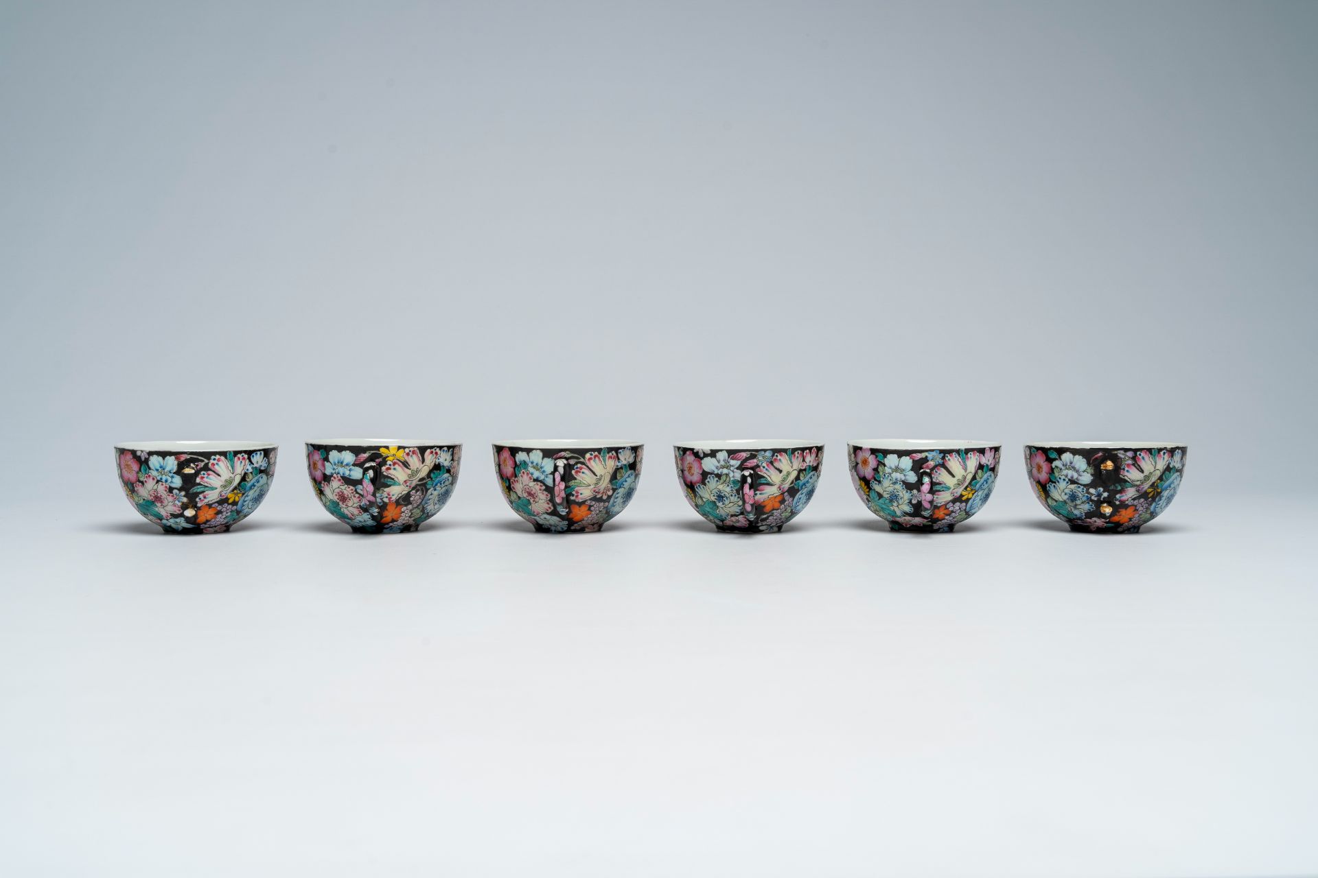 A Chinese fifteen-piece famille rose 'millefleurs' tea set with matching case, Guangxu mark, 20th C. - Image 13 of 20