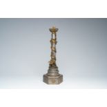 A Chinese pewter lamp base with a brass dragon in relief, first half 20th C.