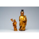 Two Chinese lacquered and gilt wood figures, 19th C.