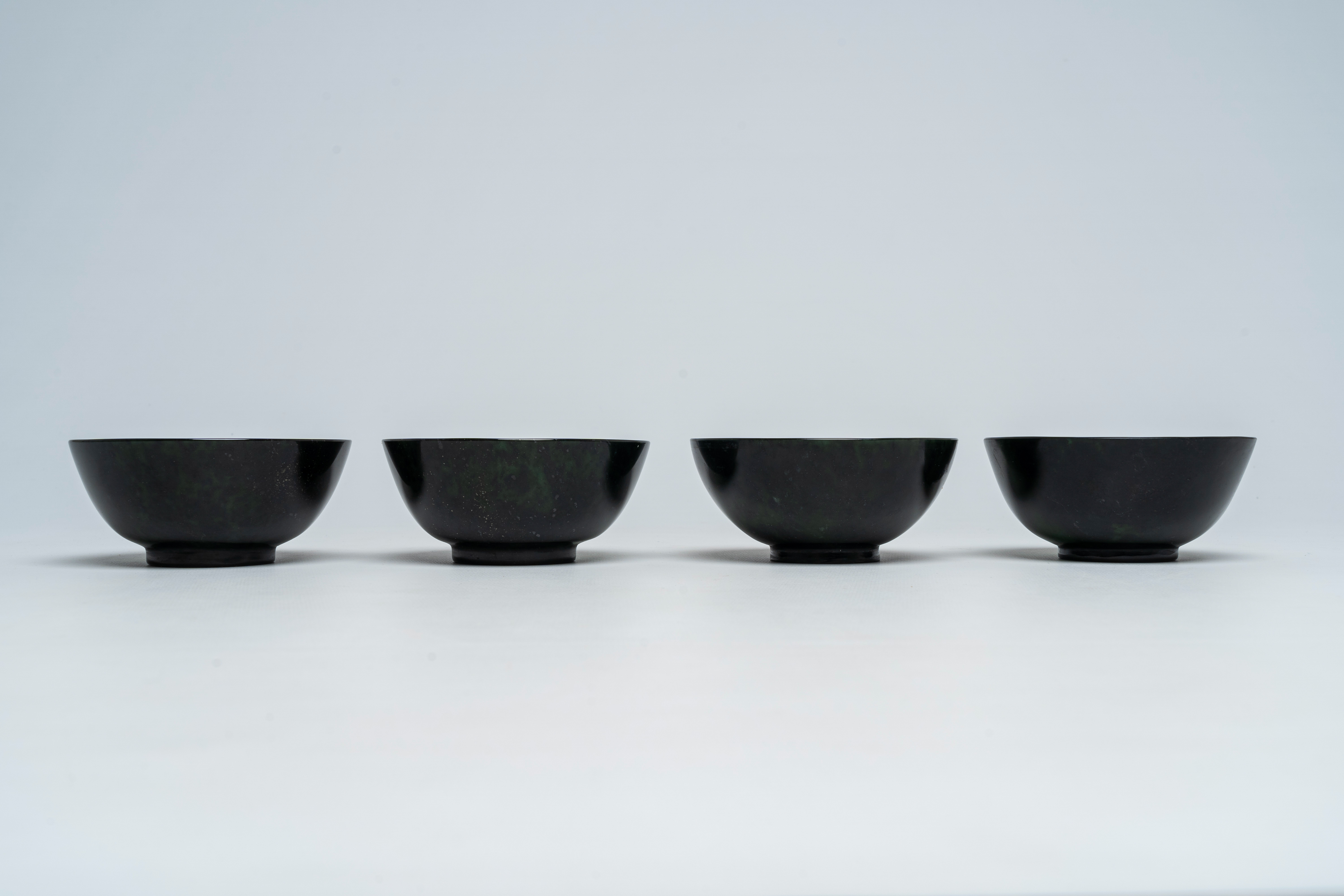 Four Chinese dark green jade bowls, 19th/20th C. - Image 2 of 8