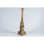 A French carved, gilt and 'faux lapis lazuli' painted floor candlestick, 19th C.