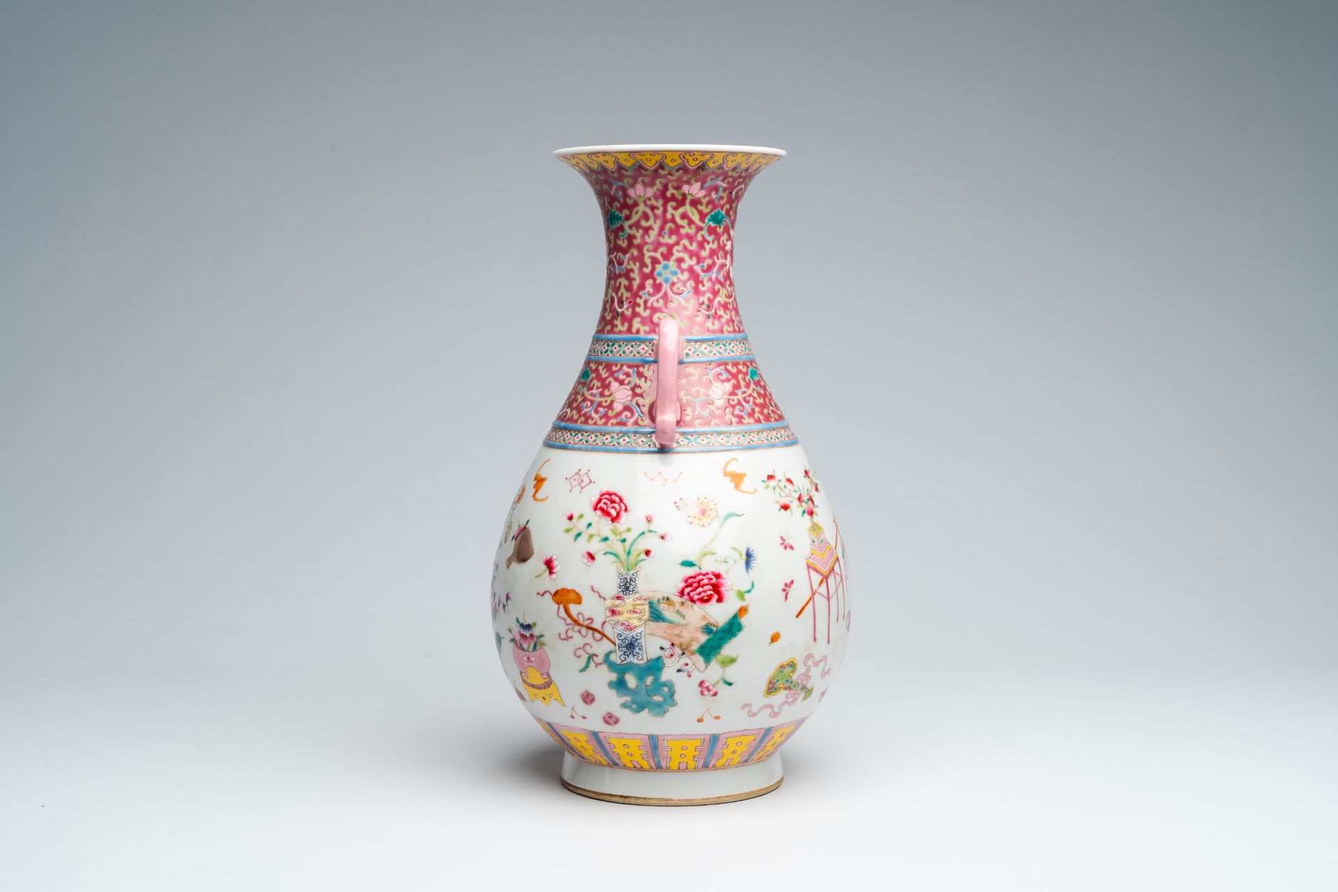 A Chinese famille rose 'yuhuchunping' vase with antiquities design, Qianlong mark, 19th C. - Image 3 of 7