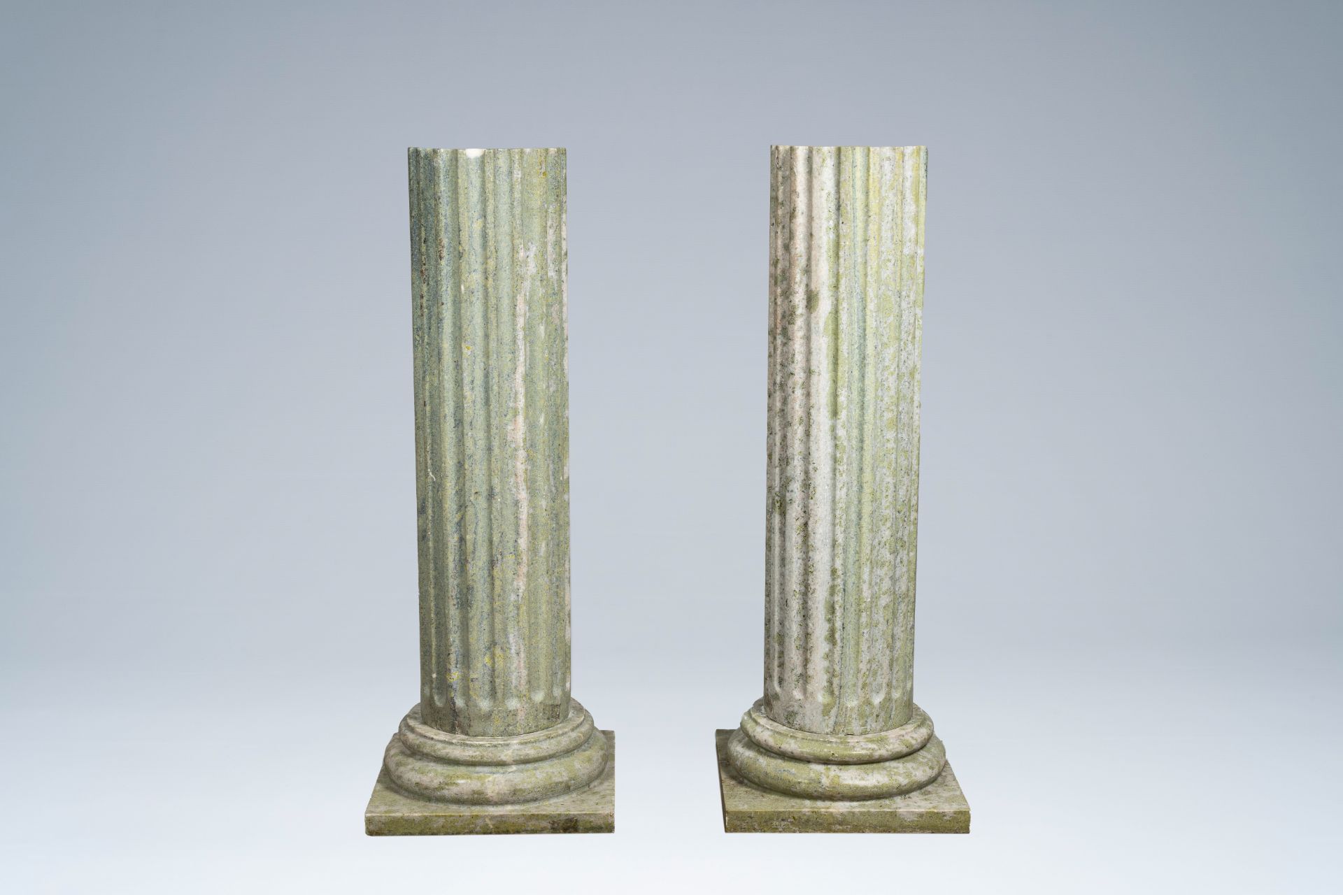 A pair of light green natural stone fluted columns, 20th C. - Image 6 of 8