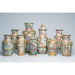 Nine Chinese Canton famille rose vases with palace scenes and floral design, 19th C.