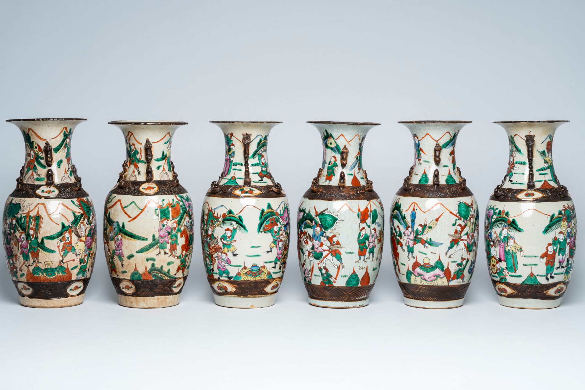 Three pairs of Chinese Nanking crackle glazed famille rose 'warrior' vases, 19th C. - Image 4 of 6