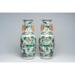 A pair of Chinese famille verte 'Immortals' vases, 19th C.