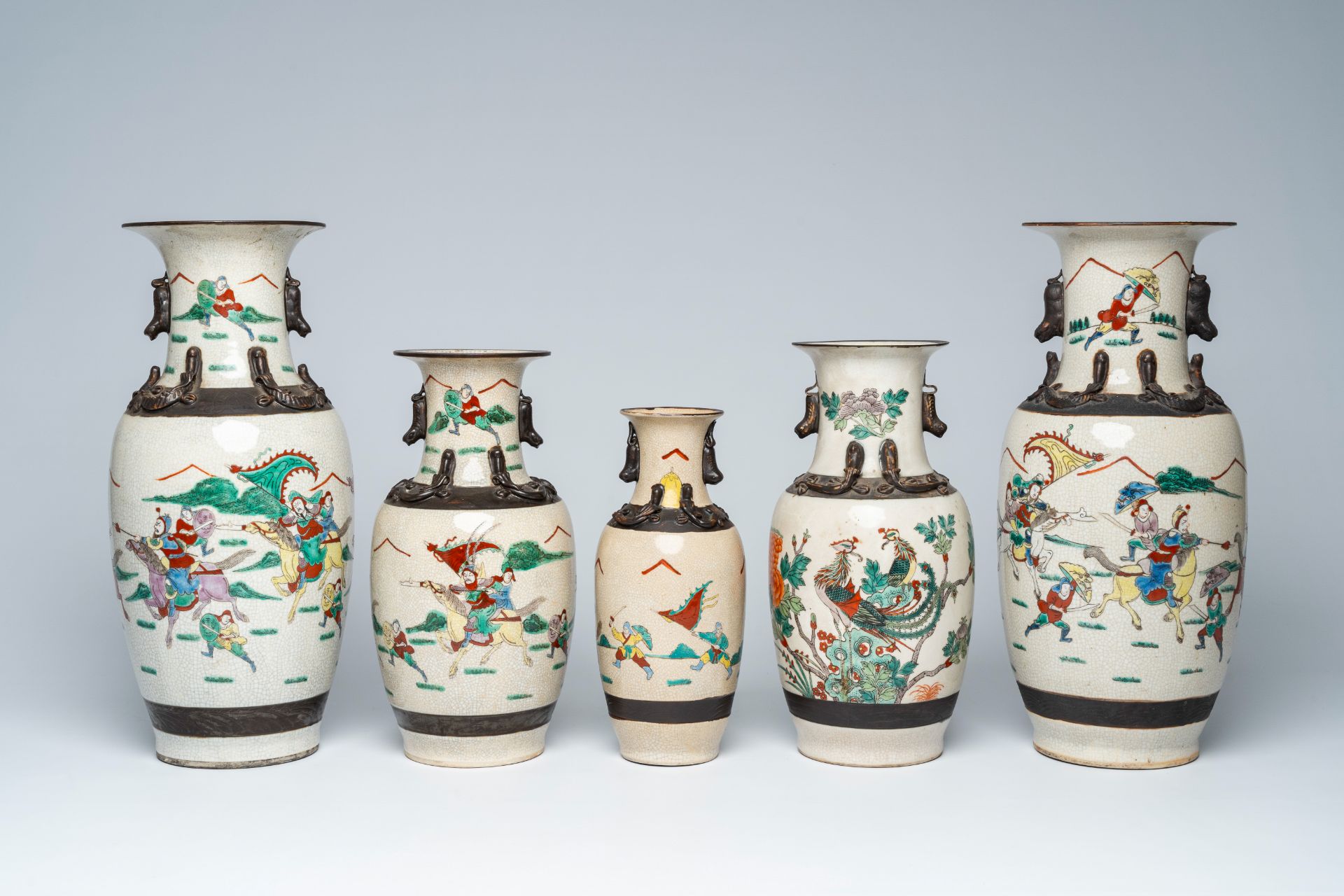 A varied collection of ten Chinese Nanking crackle glazed famille verte vases with warrior scenes an - Image 8 of 13