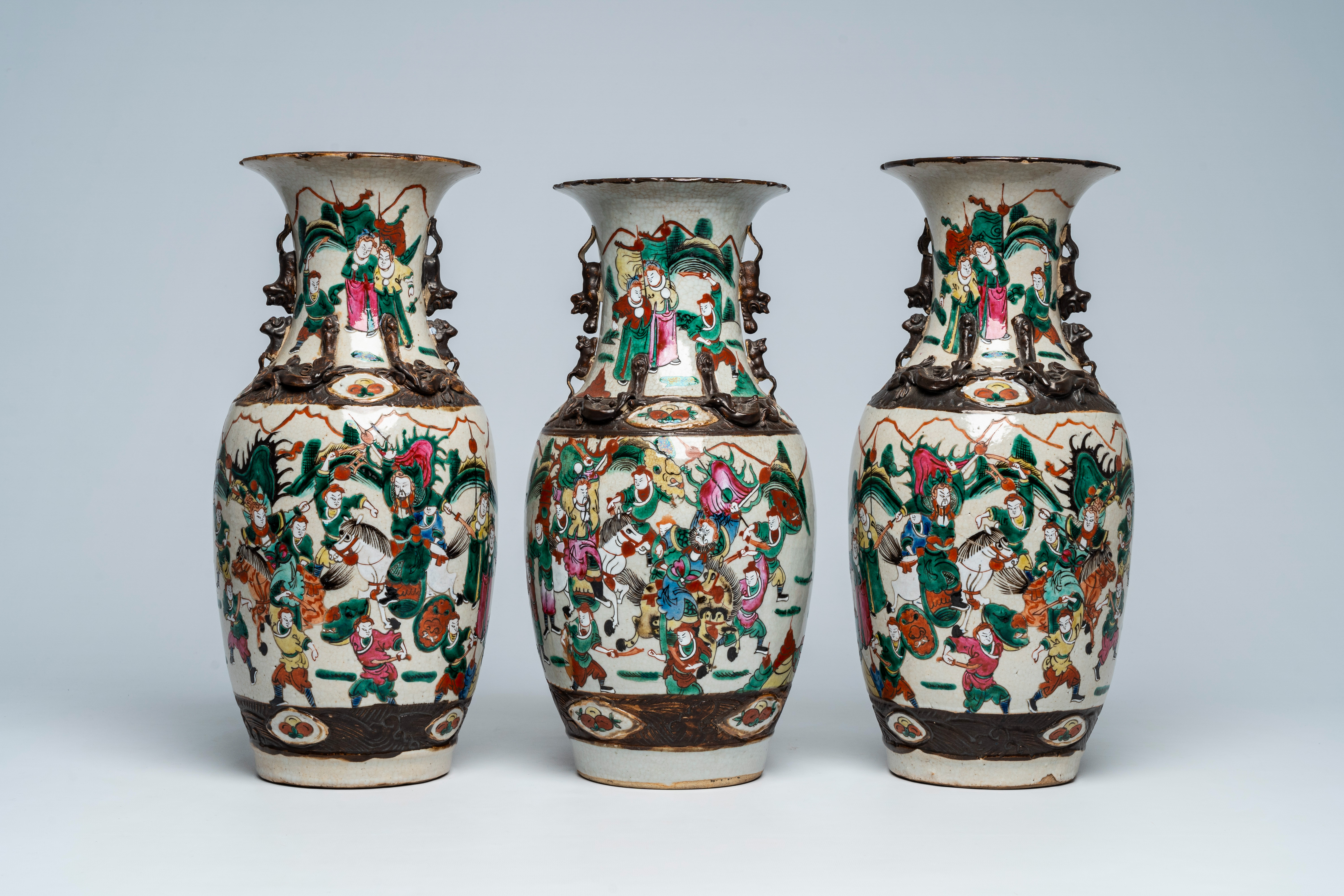 Three Chinese Nanking crackle glazed famille rose 'warrior' vases, 19th C. - Image 3 of 6