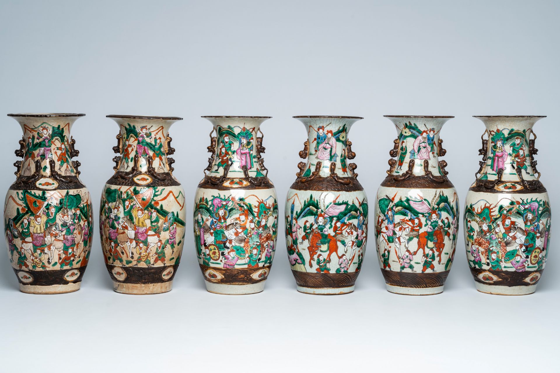 Three pairs of Chinese Nanking crackle glazed famille rose 'warrior' vases, 19th C. - Image 3 of 6