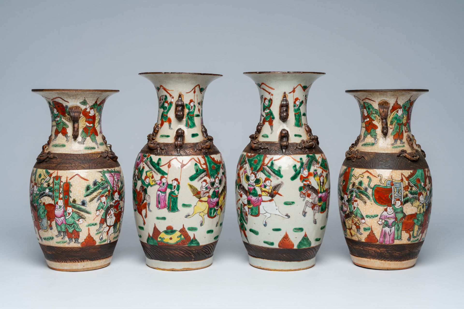 Two pairs of Chinese Nanking crackle glazed famille rose 'warrior' vases, 19th C. - Image 3 of 7