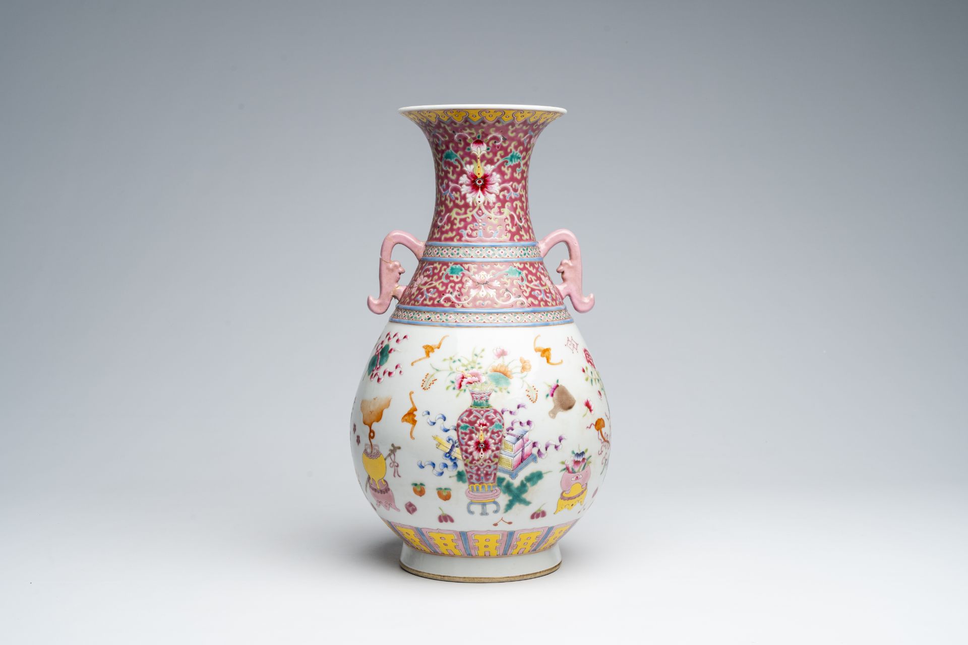 A Chinese famille rose 'yuhuchunping' vase with antiquities design, Qianlong mark, 19th C.