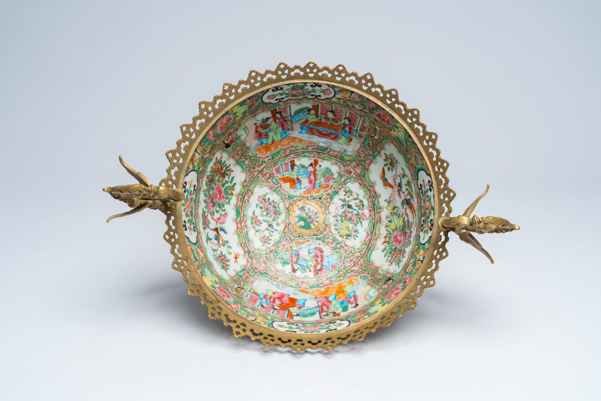 A Chinese Canton famille rose brass mounted bowl with palace scenes and floral design, 19th C. - Image 6 of 7
