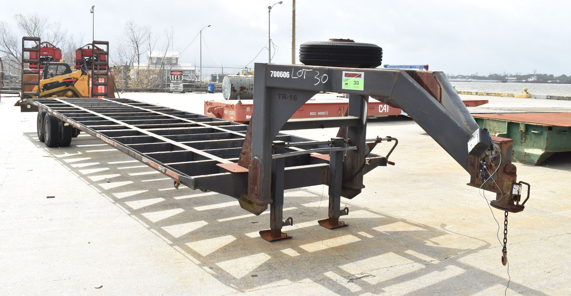 ABS WELDING APPROX. 20' TANDEM AXLE GOOSE NECK FLAT DECK TRAILER WITH 24,000 LB. GVWR CAPACITY, REAR