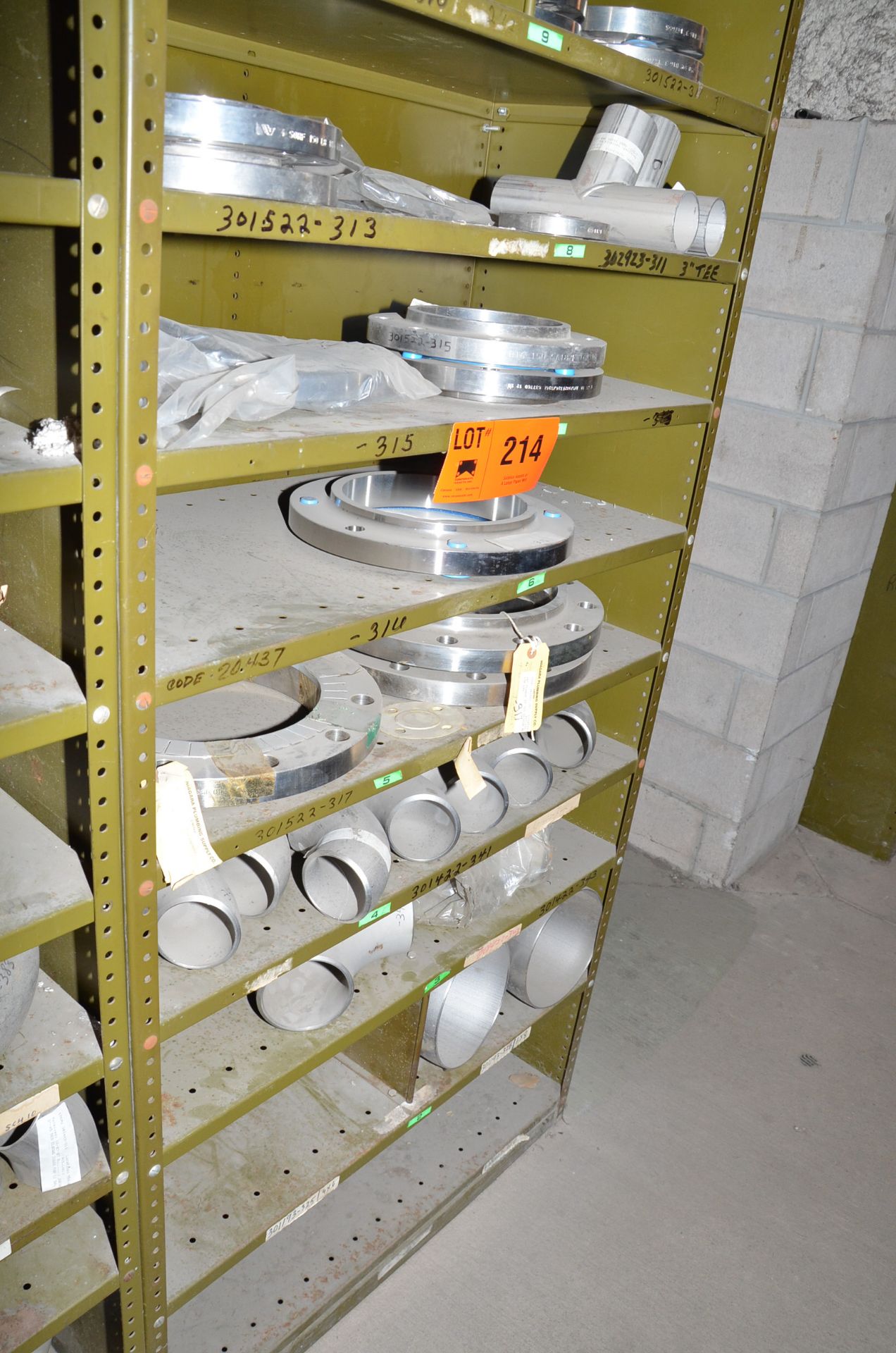 LOT/ CONTENTS OF SHELF - INCLUDING PIPE FLANGES, PIPE ELBOWS [RIGGING FEE FOR LOT #214 - $TBD USD