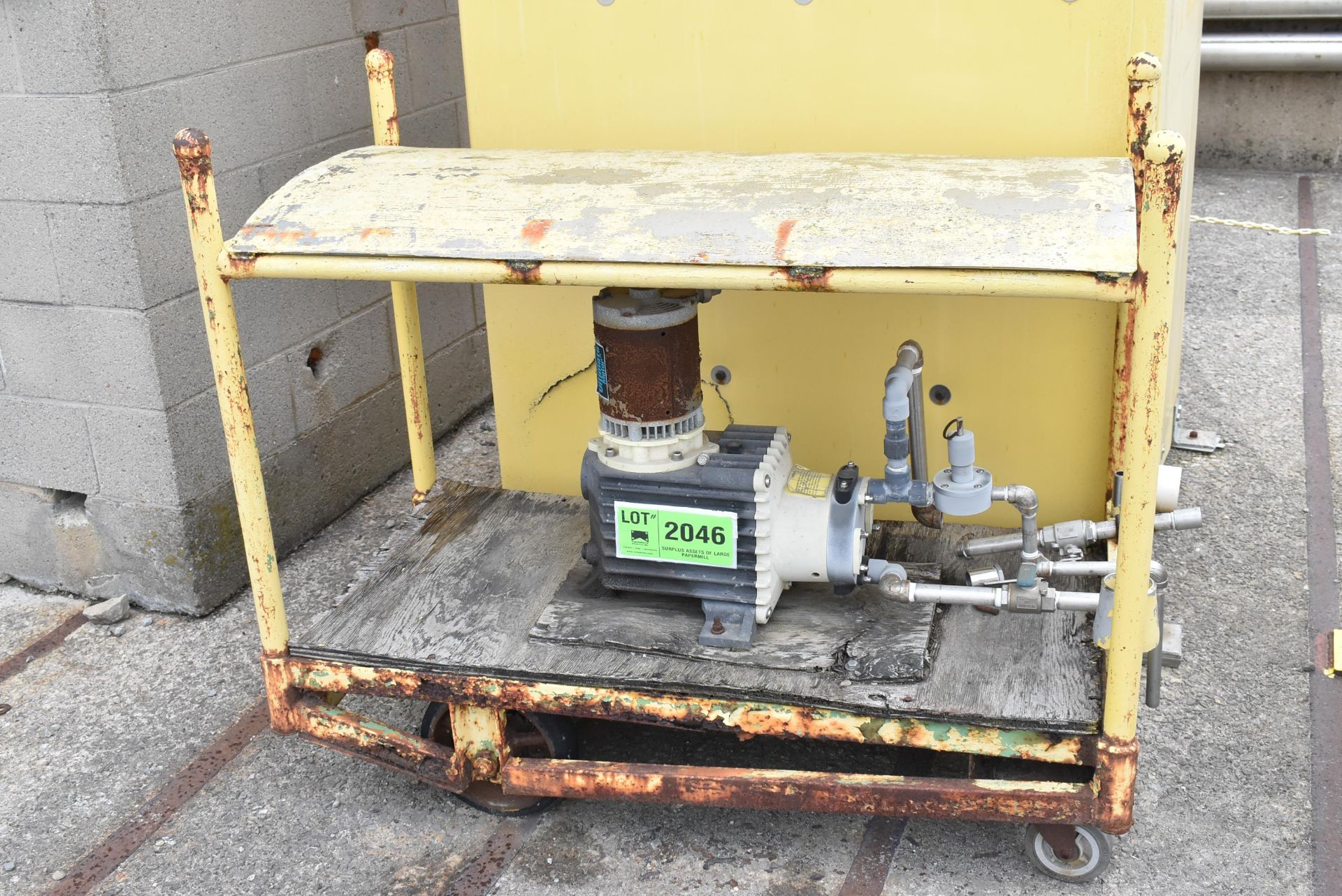 LOT/ LMI MILTON ROY METERING PUMP WITH MOTOR, PIPING & CART [RIGGING FEE FOR LOT #2046 - $25 USD