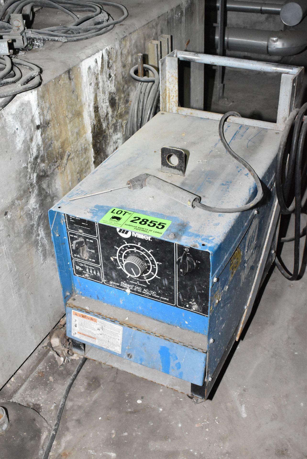 MILLER DIALARC 250 AC/DC STICK WELDER WITH CABLES & GUN, S/N: N/A [RIGGING FEE FOR LOT #2855 - $50
