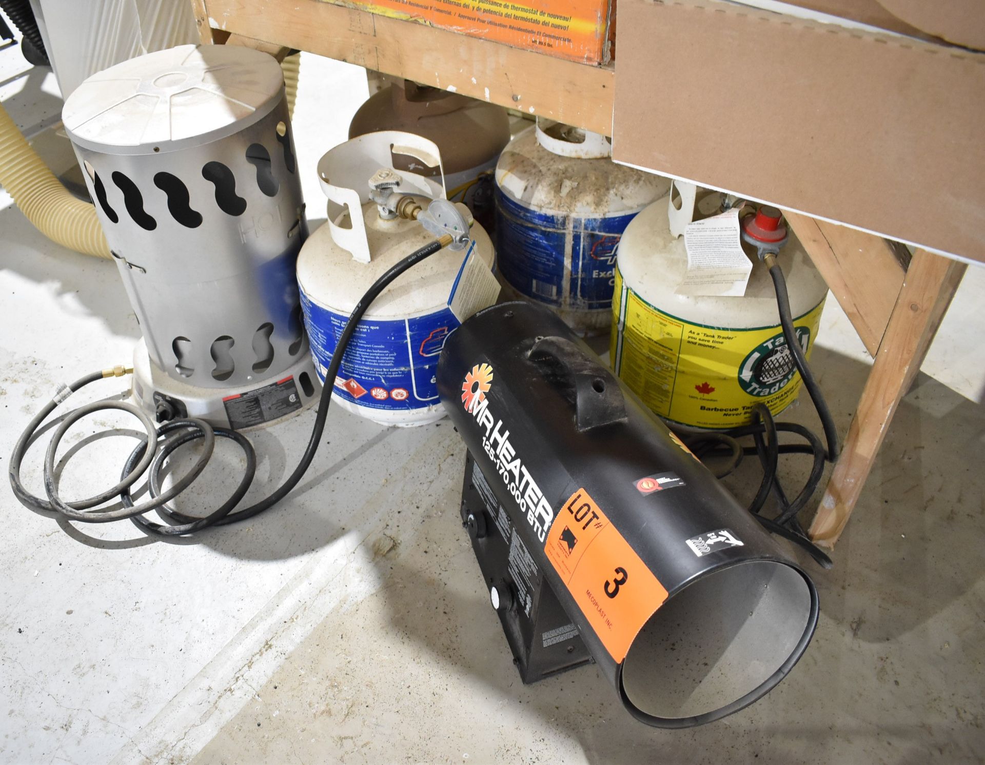 LOT/ PROPANE HEATERS AND PROPANE TANKS