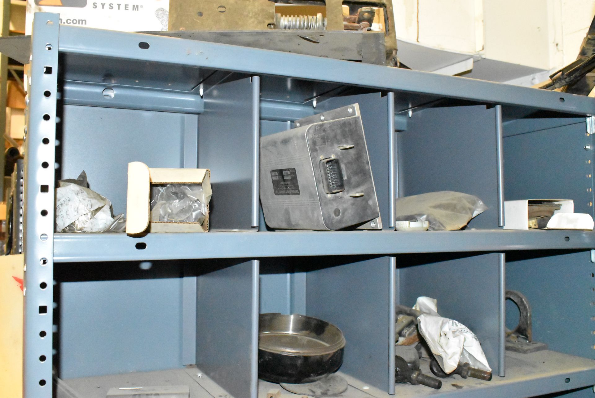 LOT/ SHELF WITH SPARE PARTS - INCLUDING LAMPS, BRAKE PARTS, PULLEYS [RIGGING FEE FOR LOT #125 - $ - Image 2 of 5