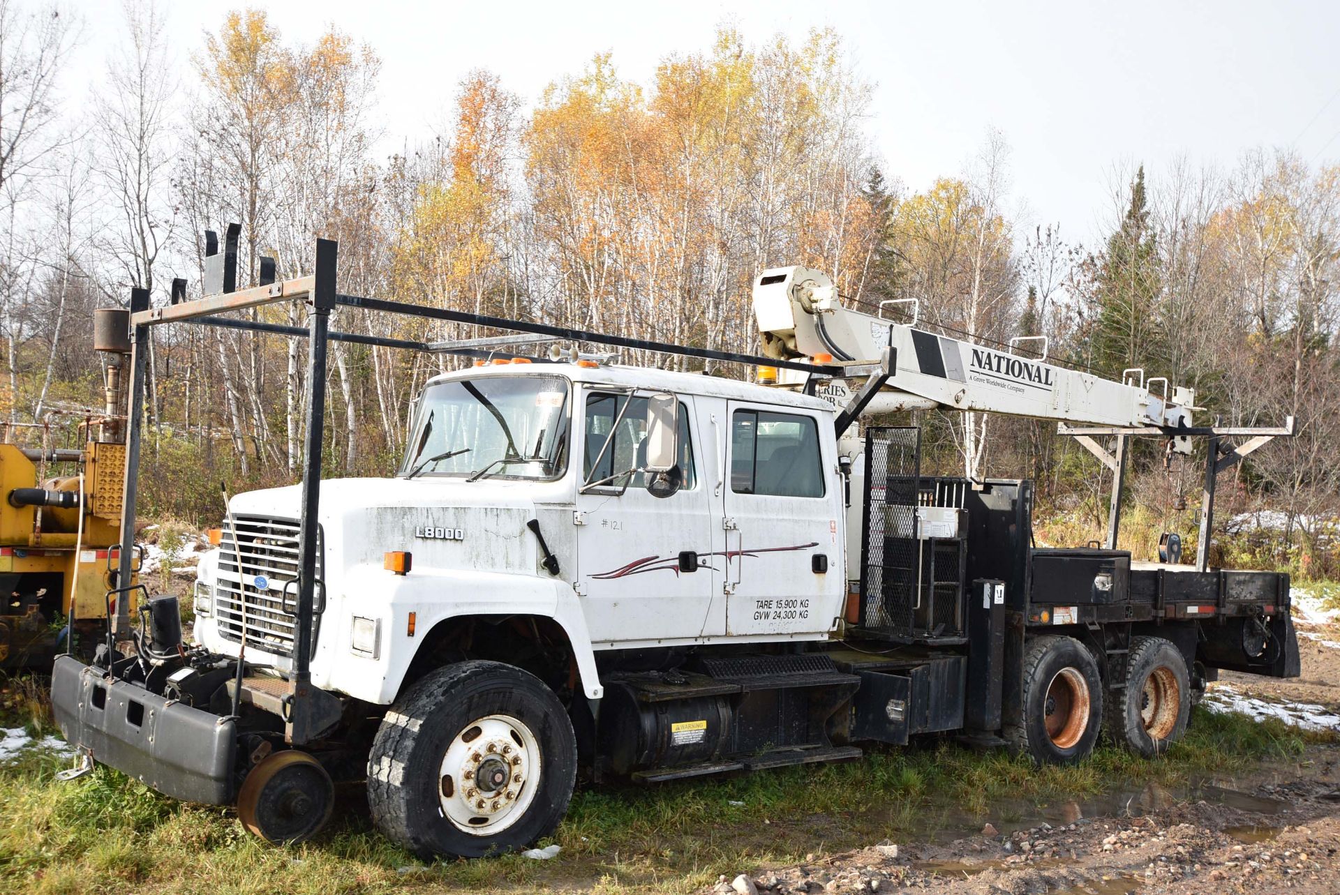 FORD (1997) LNT8000 TANDEM AXLE BOOM TRUCK WITH CREW CAB, CUMMINS FD-1460 DIESEL ENGINE, NATIONAL