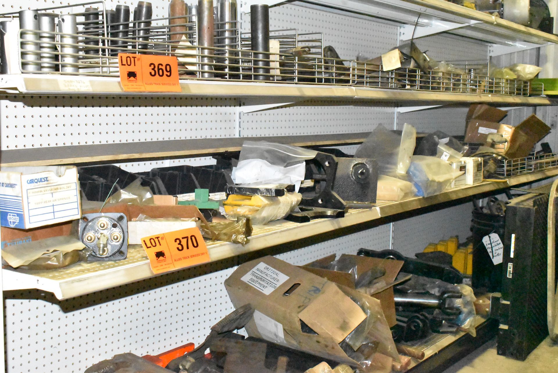 LOT/ CONTENTS OF RACK - TRIPP PARTS, CONTROLS, HYDRAULIC PARTS, CYLINDERS, BITS, BRAKE SHOES,