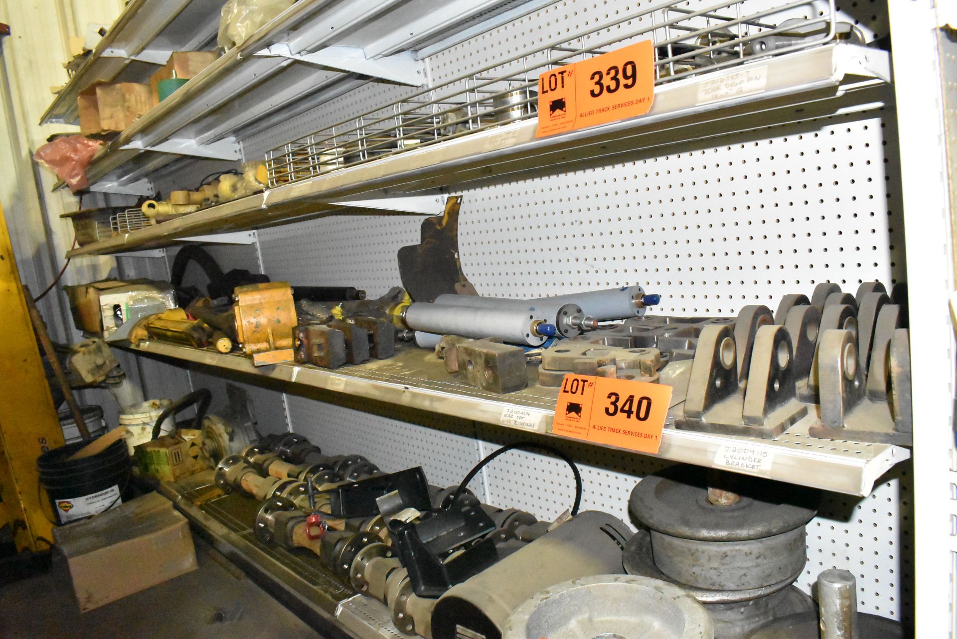 LOT/ CONTENTS OF RACK - BEARINGS, BUSHINGS, HARDWARE, GENSET PARTS, RAIL CART WHEELS AND