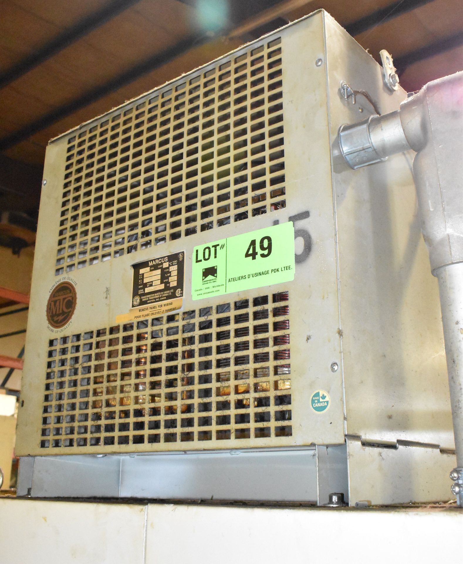 MARCUS 45 KVA TRANSFORMER WITH 600HV/220LV/3PH/60HZ, S/N: 6948-897 (CI)[RIGGING FEE FOR LOT #49 - $