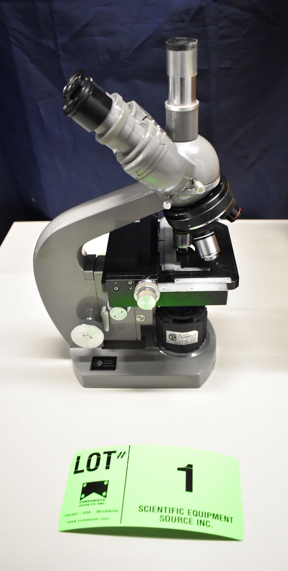 OLYMPUS 100X STEREO MICROSCOPE WITH 10X-100X MAGNIFICATION, WORK LIGHT, S/N: 208521