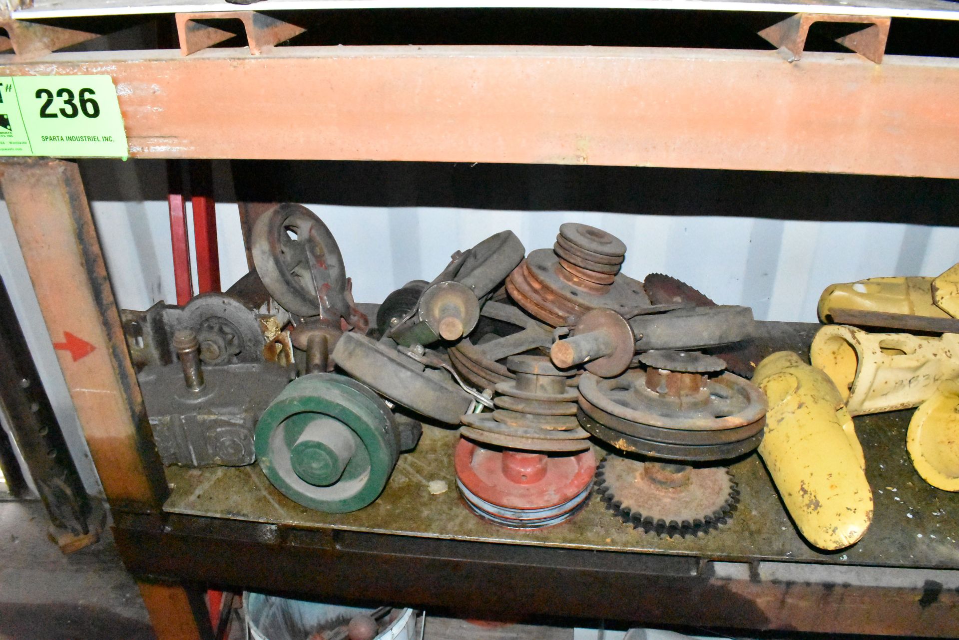 LOT/ REMAINING CONTENTS OF CONTAINER CONSISTING OF SPARE PARTS, FLY WHEELS, WIRE, ROLLERS AND BUCKET - Image 6 of 8