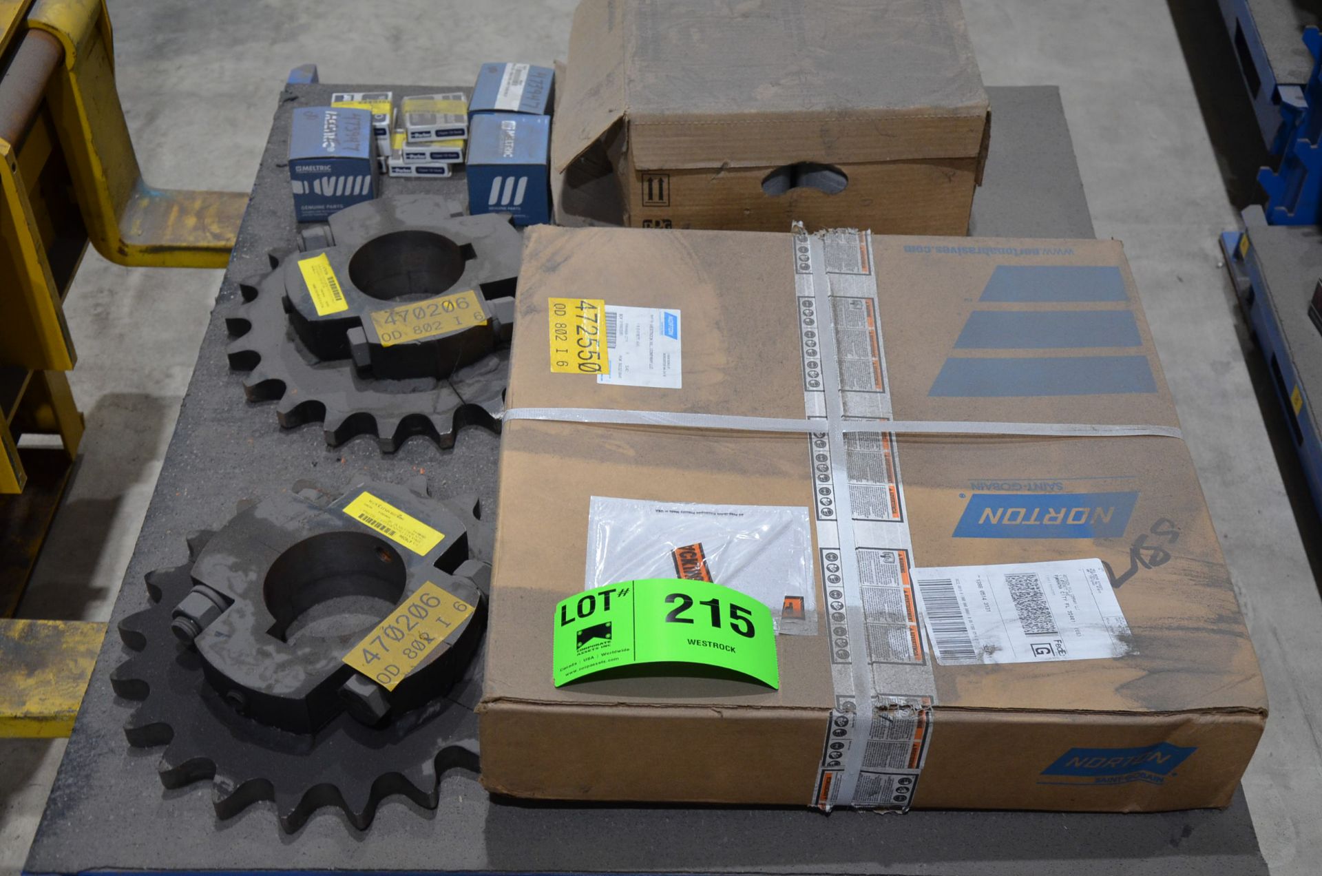 LOT/ CONTENTS OF SHELF - NORTON 20"X3"X7.5" GRINDING WHEEL, CHAIN SPROCKETS AND ELECTRICAL PLUGS