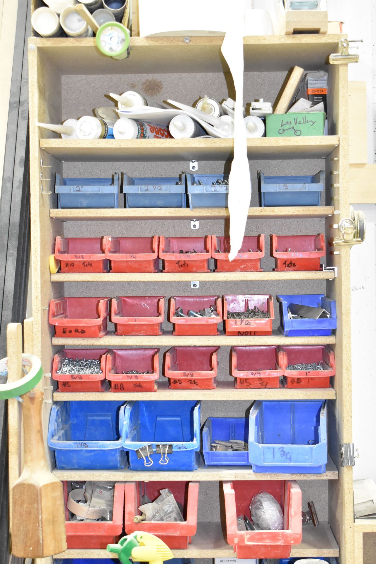 LOT/ CONTENTS ALONG WALL CONSISTING OF WORKBENCHES, TOOLS, HARDWARE, WOOD TRIM AND PANELS [RIGGING - Image 8 of 12