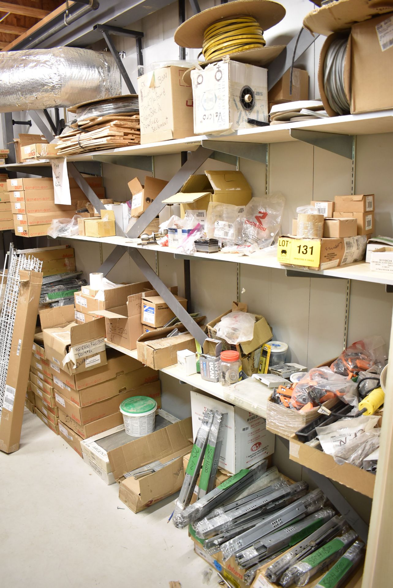 LOT/ CONTENTS OF STORAGE ROOM CONSISTING OF BLUM CABINET HARDWARE, SEALS AND SUPPLIES [RIGGING FEE