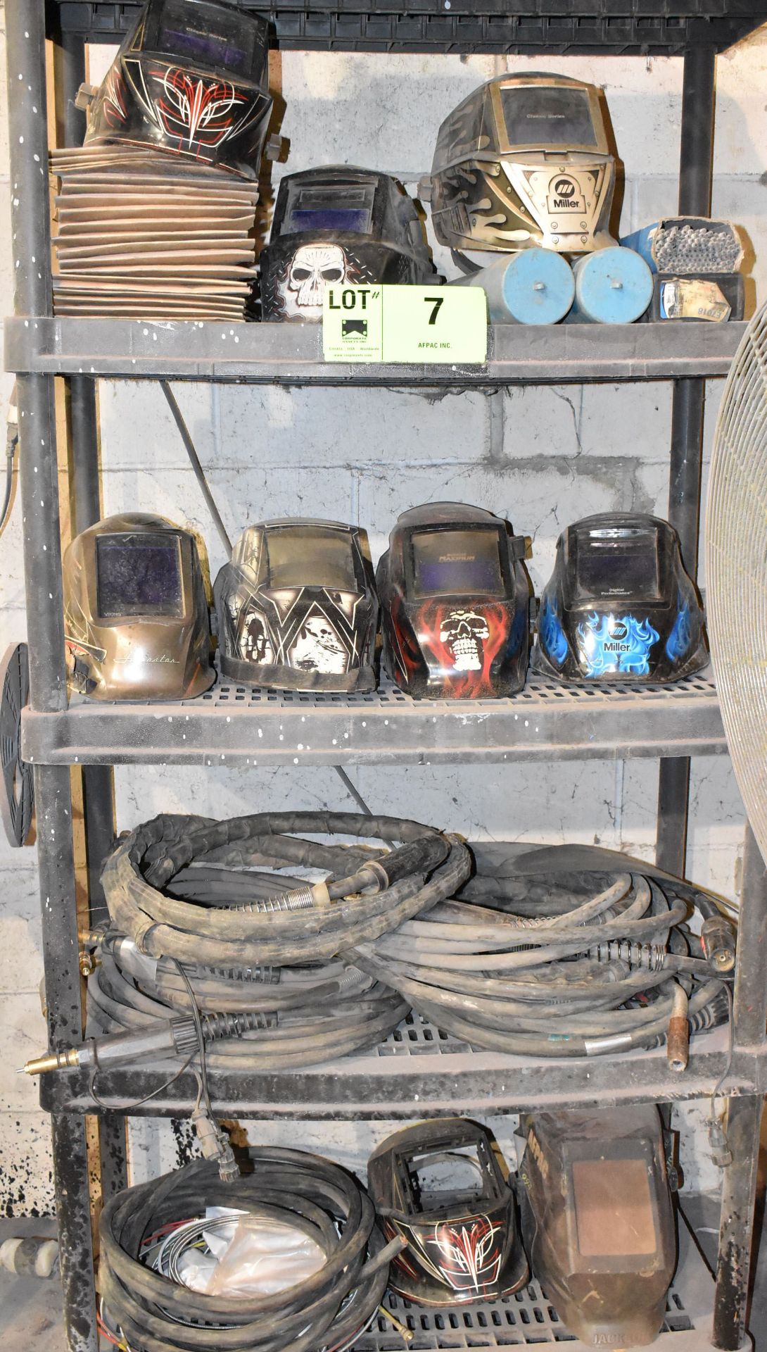 LOT/ RACK WITH CONTENTS CONSISTING OF WELDING MASKS, ELECTRODES AND GUNS