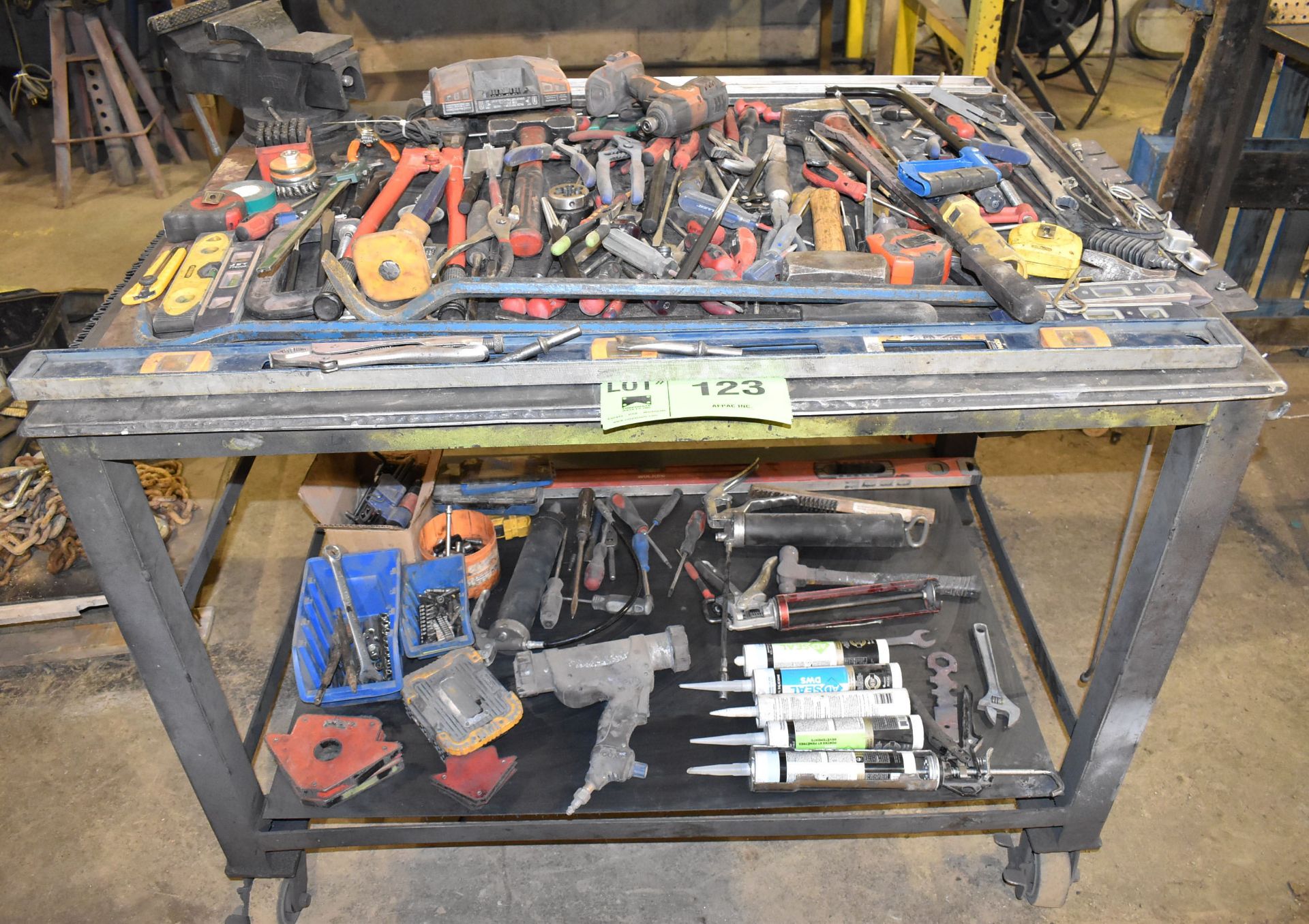 LOT/ CART WITH CONTENTS CONSISTING OF TOOLS, GREASE GUNS, SUPPLIES AND 6" BENCH VISE