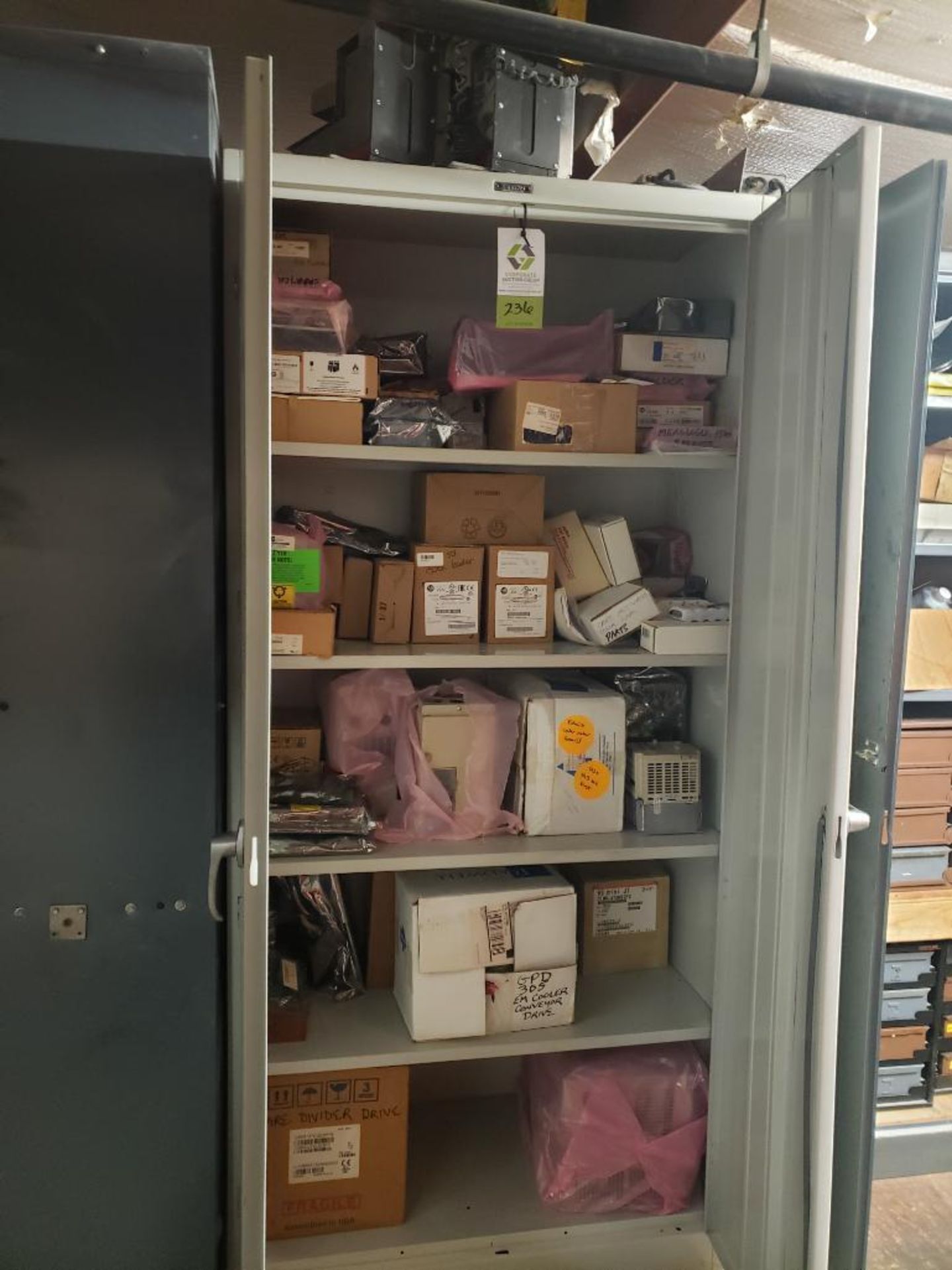 Two Door Storage Cabinet w/Contents