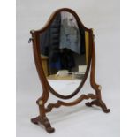 19th century shield-shaped dressing table mirror and a brown leather case (2)