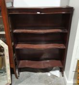 Modern mahogany bookcase with serpentine fronted shelves, 89.5cm x 130cm