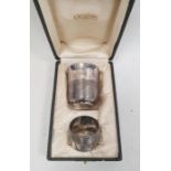 A Christofle silver-plated christening set, mid-century, comprising a cup of beaker form with reeded
